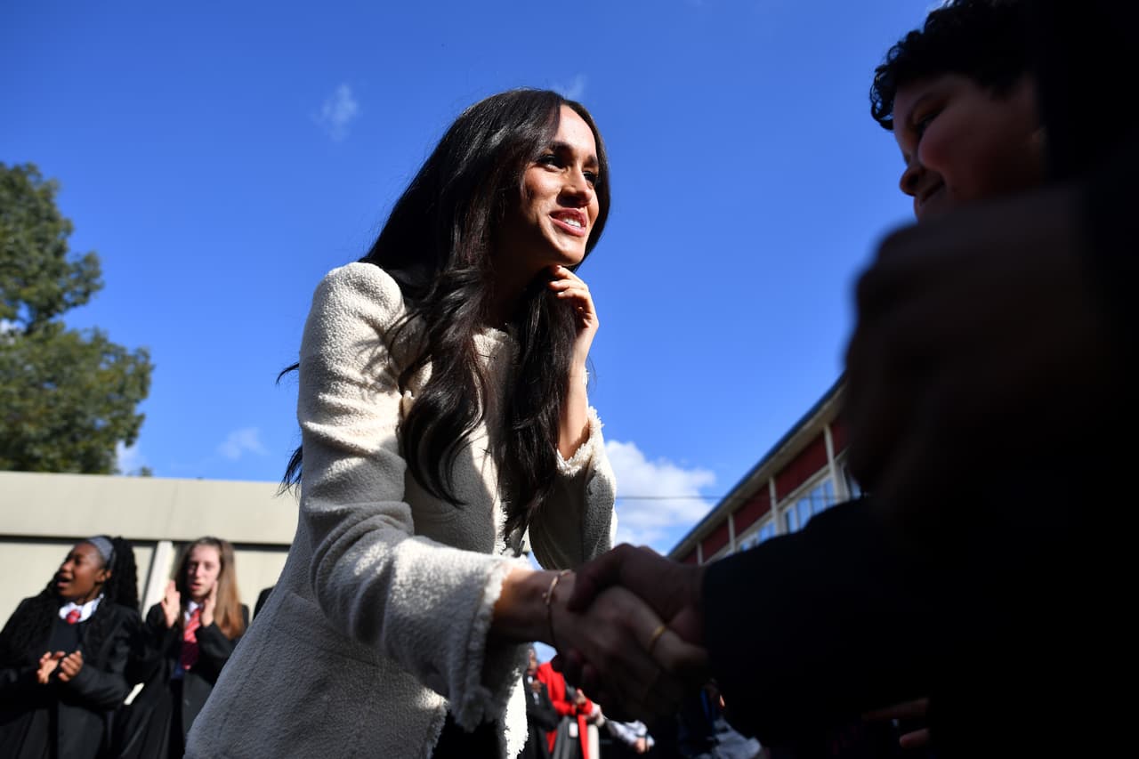 LONDON, ENGLAND - MARCH 06: Meghan, Duchess of Sussex visits the the Robert Clack Upper School in Dagenham to attend a special assembly ahead of International Women’s Day (IWD) held on Sunday 8th March, on March 6, 2020 in London, England. (Photo by Ben Stansall-WPA Pool/Getty Images)