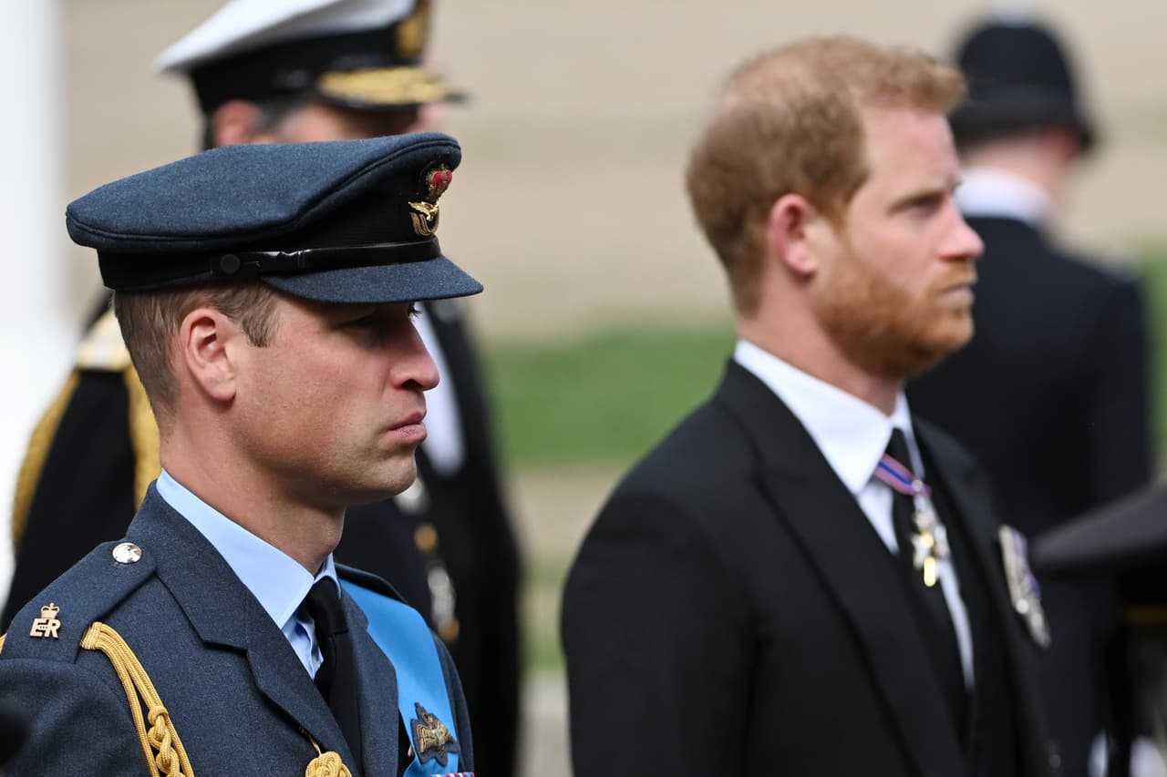 LONDON, ENGLAND - SEPTEMBER 19: Prince William, Prince of Wales and Prince Harry, Duke of Sussex follow behind The Queen's funeral cortege borne on the State Gun Carriage of the Royal Navy as it leaves Westminster Abbey on September 19, 2022 in London, England. Elizabeth Alexandra Mary Windsor was born in Bruton Street, Mayfair, London on 21 April 1926. She married Prince Philip in 1947 and ascended the throne of the United Kingdom and Commonwealth on 6 February 1952 after the death of her Father, King George VI. Queen Elizabeth II died at Balmoral Castle in Scotland on September 8, 2022, and is succeeded by her eldest son, King Charles III. (Photo by Jeff Spicer/Getty Images)