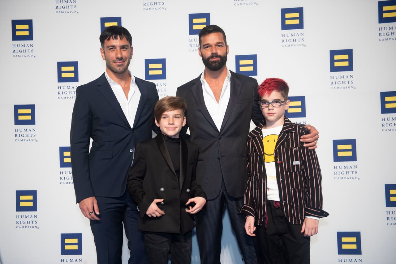IMAGE DISTRIBUTED FOR THE HUMAN RIGHTS CAMPAIGN - Ricky Martin, his husband Jwan Yosef and their twins arrive at the 2019 Human Rights Campaign National Dinner on Saturday, Sept. 28, 2019 in Washington. While receiving the HRC National Visibility Award, Martin announced he and Yosef are expecting their fourth child. (Kevin Wolf/AP Images for The Human Rights Campaign)