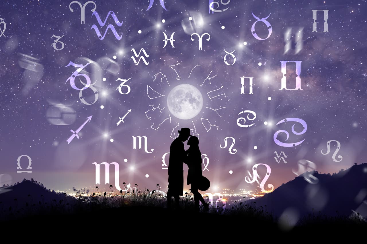 Astrological zodiac signs inside of horoscope circle. Couple singing and dancing over the zodiac wheel and milky way background. The power of the universe concept.