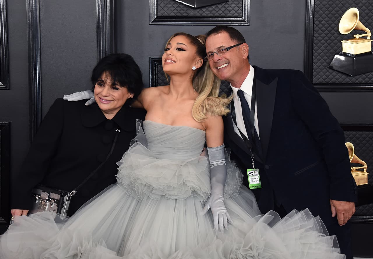 Joan Grande, from left, Ariana Grande, and Edward Butera arrive at the 62nd annual Grammy Awards at the Staples Center on Sunday, Jan. 26, 2020, in Los Angeles. (Photo by Jordan Strauss/Invision/AP)