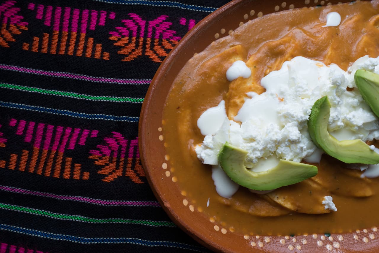 Traditional mexican enfrijoladas