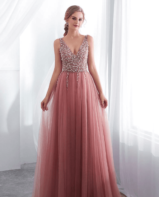 Un estilo mucho más tierno y sutil con colores rosa pastel y falda de tul.