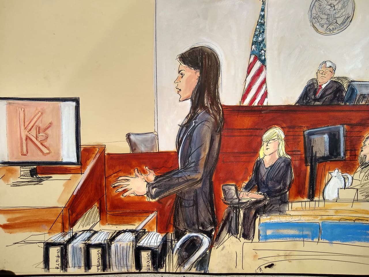 In this courtroom drawing, Assistant US Attorney Tanya Hajjar, left, gives opening statement to jury as Judge Nicholas Garaufis listens from the right, in the sex trafficking trial of NXIVM group leader Keith Raniere, Tuesday, May 7, 2019 in New York. The image on the left side screen is a photo of the branded mark made on a woman with Raniere's initials. (Elizabeth Williams via AP)