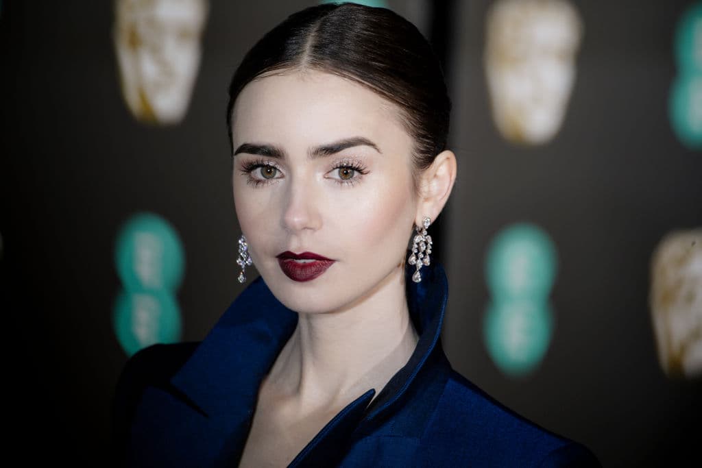 LONDON, ENGLAND - FEBRUARY 10: Lily Collins attends the EE British Academy Film Awards at Royal Albert Hall on February 10, 2019 in London, England. (Photo by Gareth Cattermole/Getty Images)