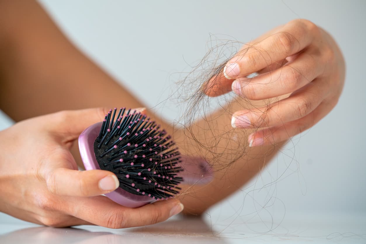 Losing hair? Hair brush, complete with hair.