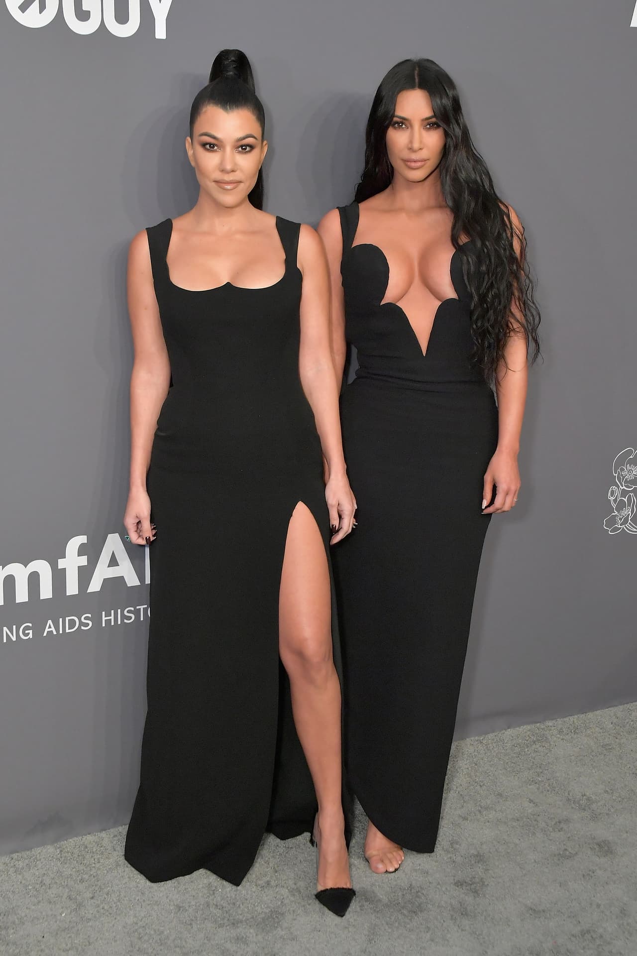 NEW YORK, NY - FEBRUARY 06: Kourtney Kardashian and Kim Kardashian West attend the amfAR New York Gala 2019 at Cipriani Wall Street on February 6, 2019 in New York City. (Photo by Michael Loccisano/Wire Image)