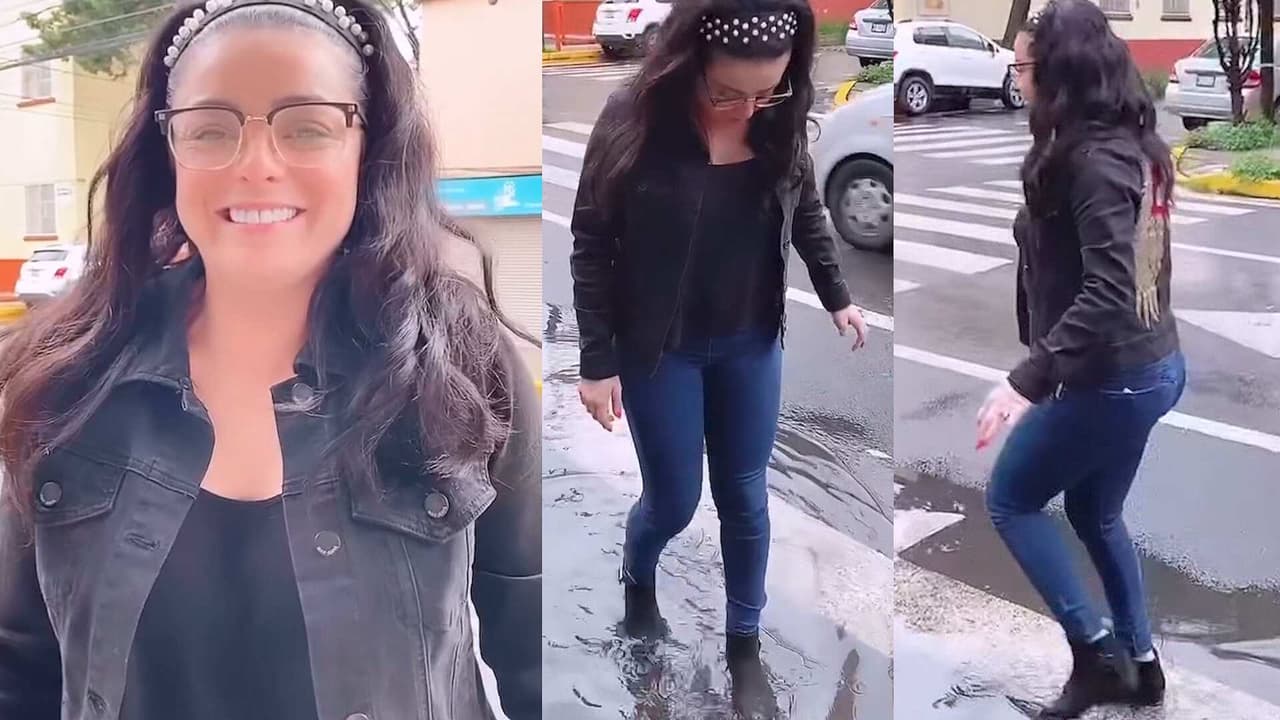 Violeta Isfel sacó a su niña interior y se metió a jugar a los charcos de agua