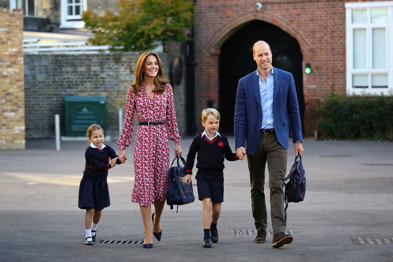 Britain's Princess Charlotte, left, with her brother Prince George and their parents Prince William and Kate, Duchess of Cambridge, arrives for her first day of school at Thomas's Battersea in London, Thursday Sept. 5, 2019. (Aaron Chown/Pool via AP)