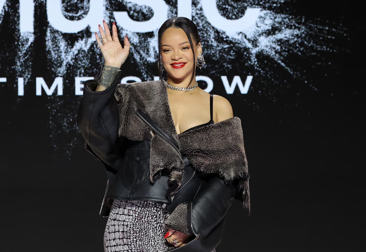 PHOENIX, ARIZONA - FEBRUARY 09: Rihanna speaks onstage during the Super Bowl LVII Pregame & Apple Music Super Bowl LVII Halftime Show Press Conference at Phoenix Convention Center on February 09, 2023 in Phoenix, Arizona. (Photo by Mike Coppola/Getty Images)