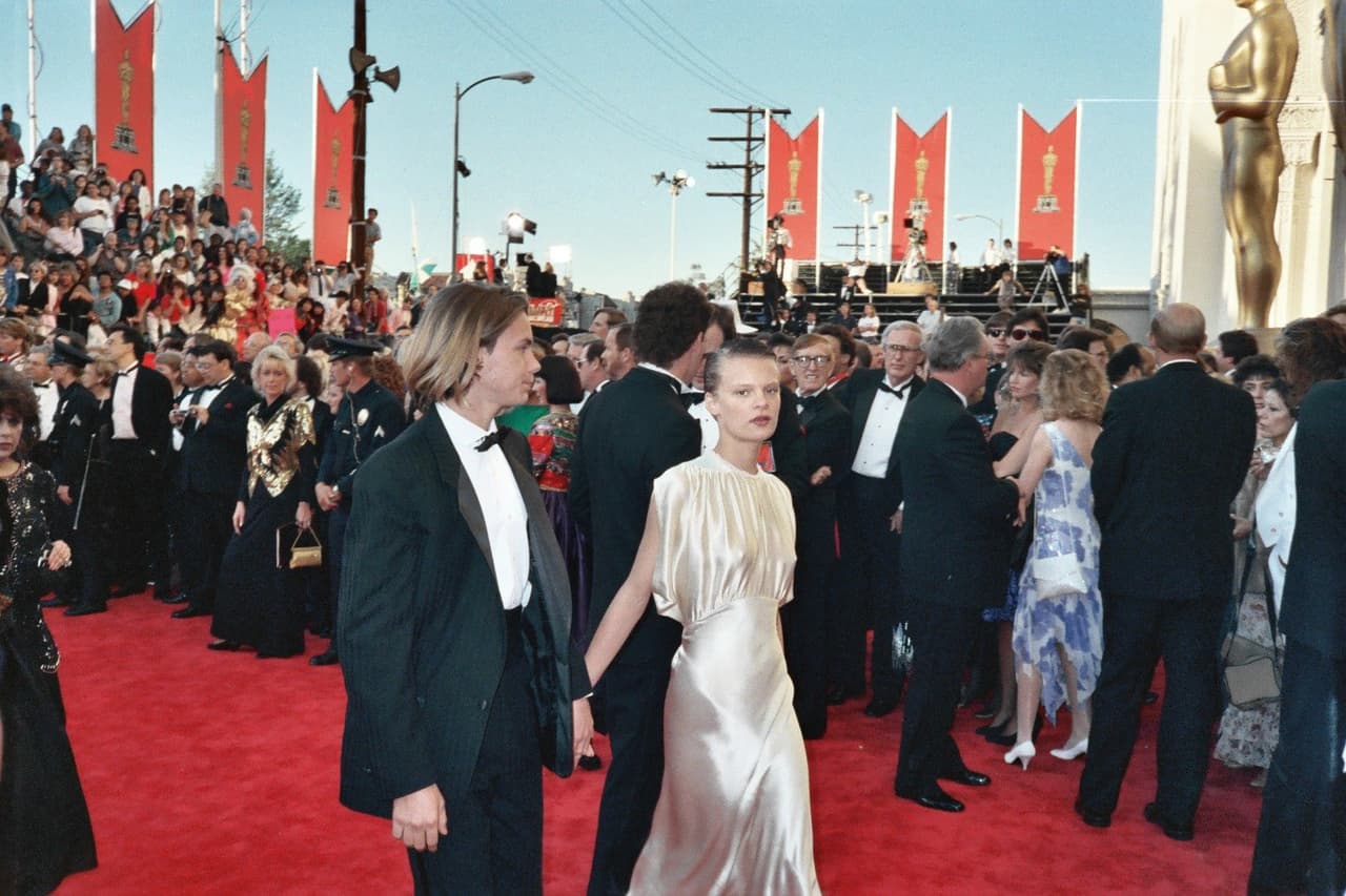 River Phoenix y Martha Plimpton en la alfombra roja de los Óscares de 1989.