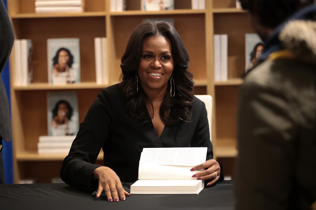 CHICAGO, IL - NOVEMBER 13: Former first lady Michelle Obama kicks off her Becoming book tour with a signing at the Seminary Co-op bookstore on November 13, 2018 in Chicago, Illinois. In the book, which was released today, Obama describes her journey from Chicago's South Side to the White House. (Photo by Scott Olson/Getty Images)