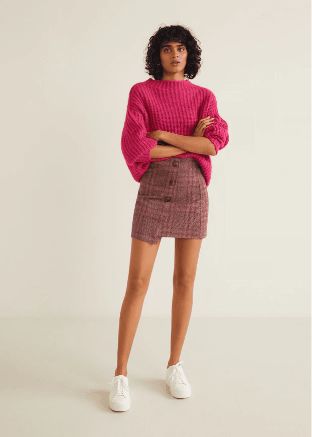 Falda asímetrica tipo mini. Marca: Mango.
