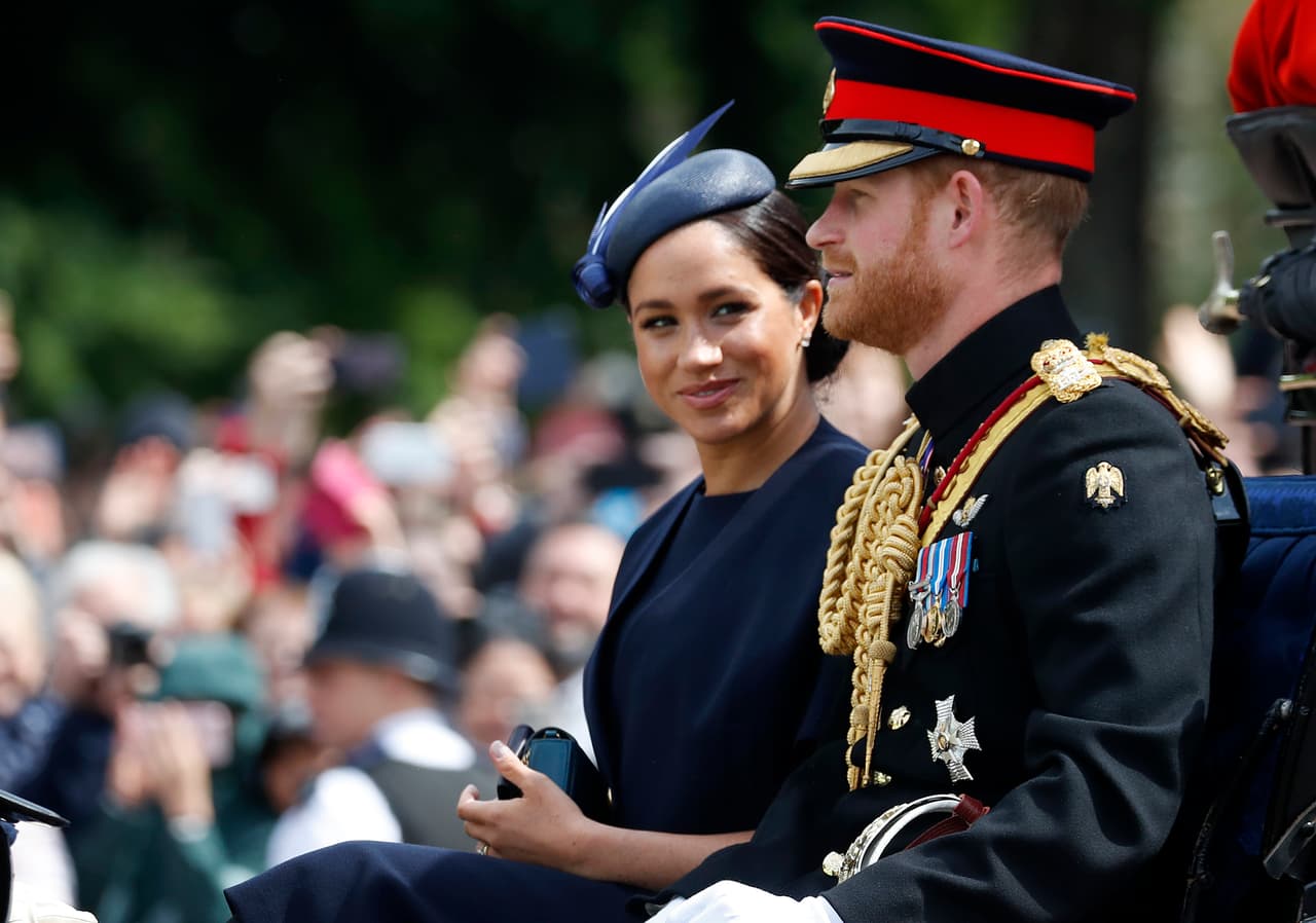 Britain's Meghan, the Duchess of Sussex and Prince Harry ride in a carriage to attend the annual Trooping the Colour Ceremony in London, Saturday, June 8, 2019. Trooping the Colour is the Queen's Birthday Parade and one of the nation's most impressive and iconic annual events attended by almost every member of the Royal Family. (AP Photo/Frank Augstein)