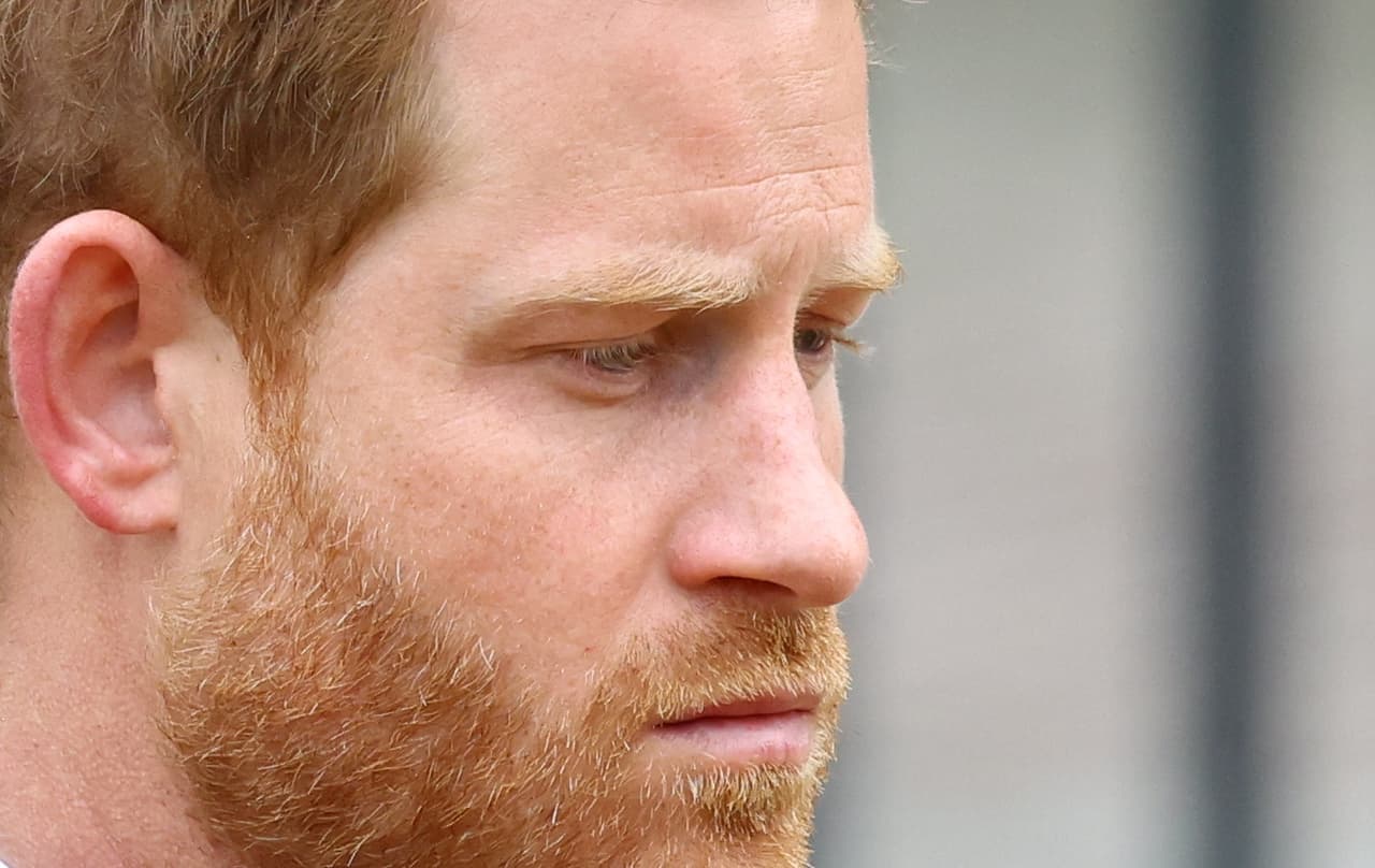 LONDON, ENGLAND - SEPTEMBER 19: Prince Harry, Duke of Sussex, reacts as he attends the State Funeral of Queen Elizabeth II at Westminster Abbey on September 19, 2022 in London, England. Elizabeth Alexandra Mary Windsor was born in Bruton Street, Mayfair, London on 21 April 1926. She married Prince Philip in 1947 and ascended the throne of the United Kingdom and Commonwealth on 6 February 1952 after the death of her Father, King George VI. Queen Elizabeth II died at Balmoral Castle in Scotland on September 8, 2022, and is succeeded by her eldest son, King Charles III. (Photo by Hannah McKay- WPA Pool/Getty Images)