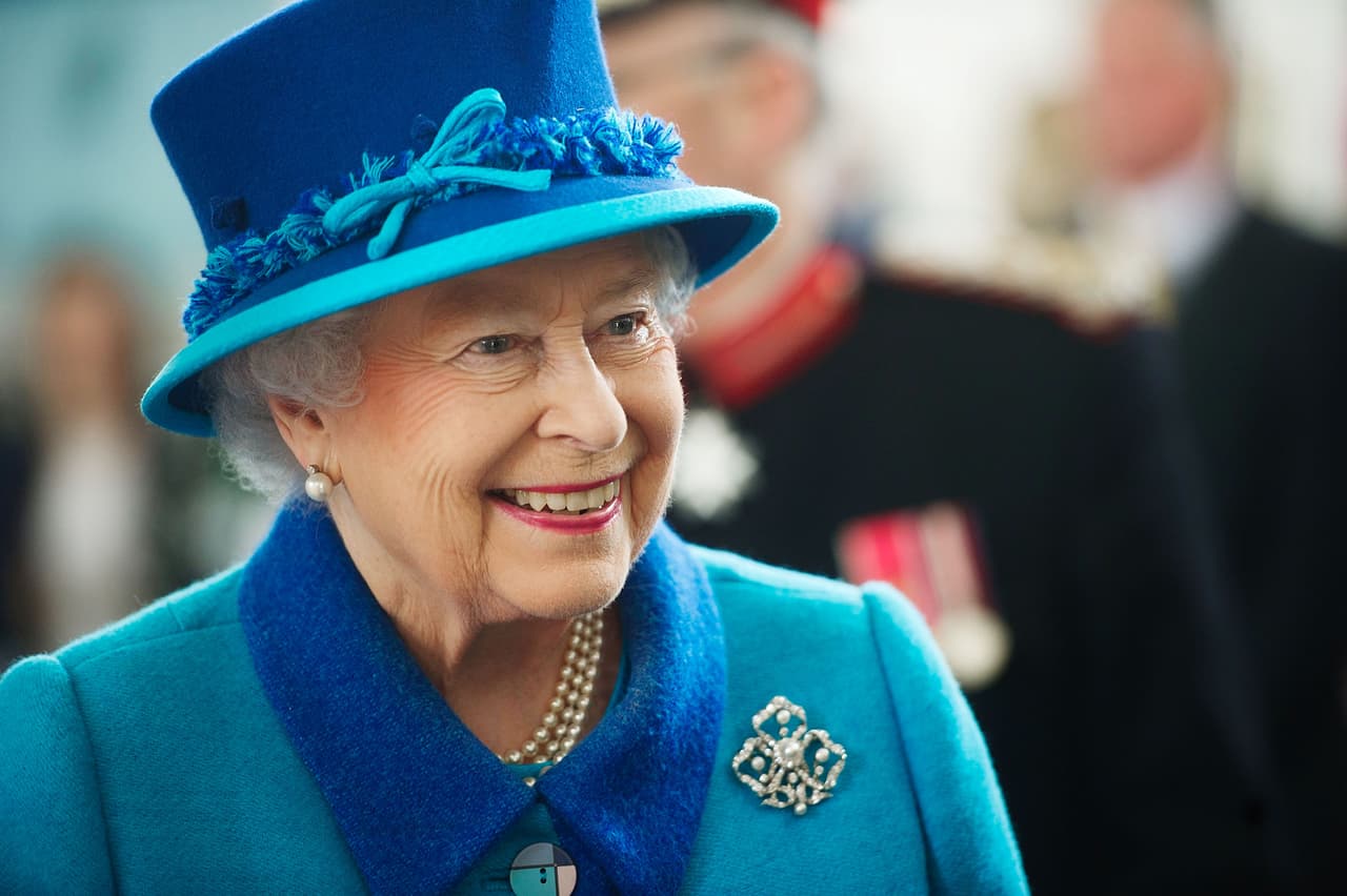 PEMBROKE DOCK, WALES - APRIL 29: Queen Elizabeth II during a visit to the Chapel to view the restoration and meet local people involved with the project at the Royal Dockyard Chapel during an official visit on April 29, 2014 in Pembroke Dock, United Kingdom. This year sees the 200th anniversary of the town of Pembroke Dock. The Royal Dockyard Chapel has undergone a restoration project to become the base for Pembroke Dock's Heritage Centre which celebrates 200 years of a unique naval and military community. (Photo by Bethany Clarke/Getty Images)