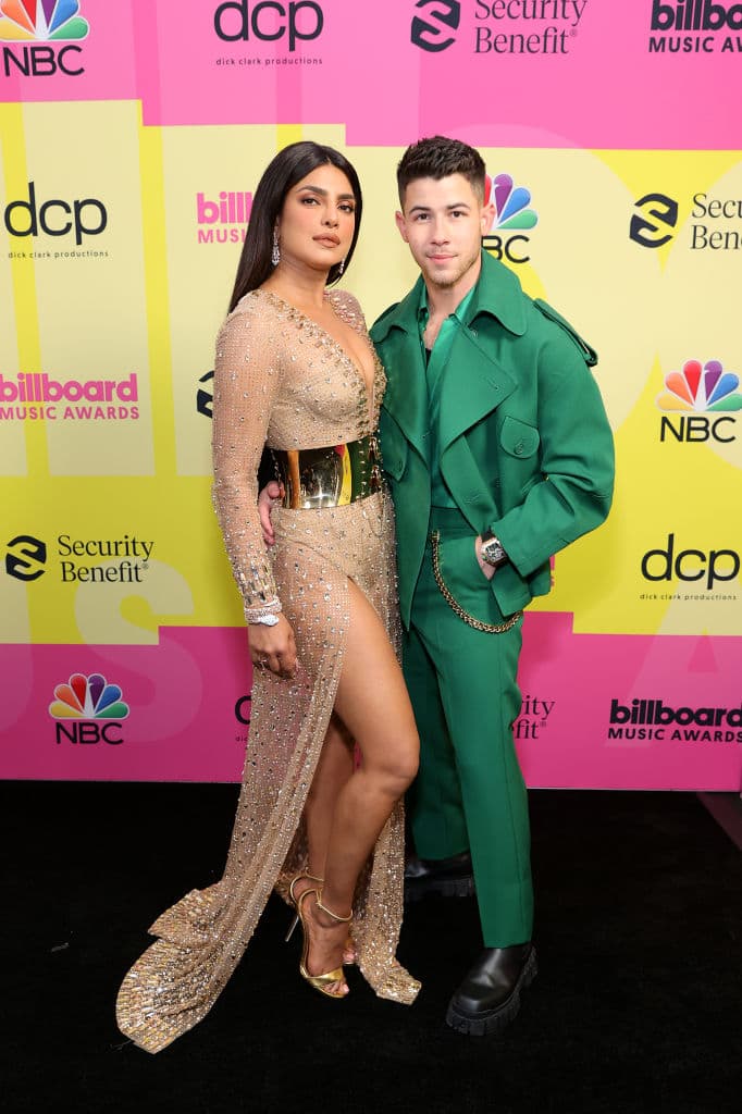 LOS ANGELES, CALIFORNIA - MAY 23: (L-R) Priyanka Chopra Jonas and Nick Jonas pose backstage for the 2021 Billboard Music Awards, broadcast on May 23, 2021 at Microsoft Theater in Los Angeles, California. (Photo by Rich Fury/Getty Images for dcp)