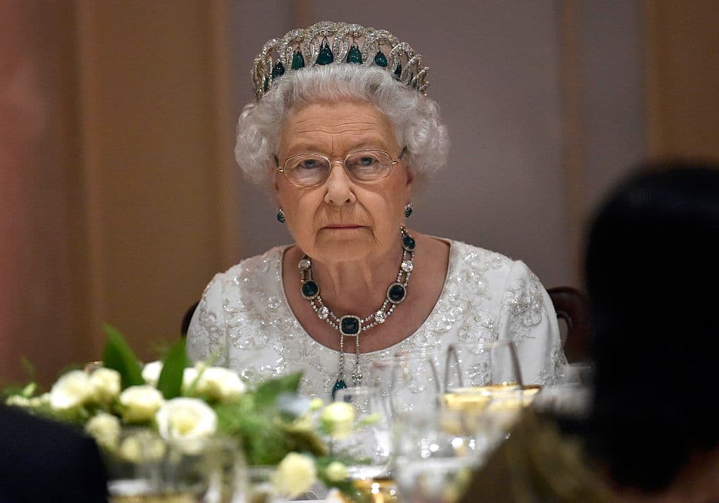 VALLETTA, MALTA - NOVEMBER 27: Queen Elizabeth II looks serious as she attends a dinner at the Corinthia Palace Hotel in Attard during the Commonwealth Heads of Government Meeting (CHOGM) on November 27, 2015 near Valletta, Malta. Queen Elizabeth II, The Duke of Edinburgh, Prince Charles, Prince of Wales and Camilla, Duchess of Cornwall arrived today to attend the Commonwealth Heads of State Summit. (Photo by Toby Melville -Pool/Getty Images)