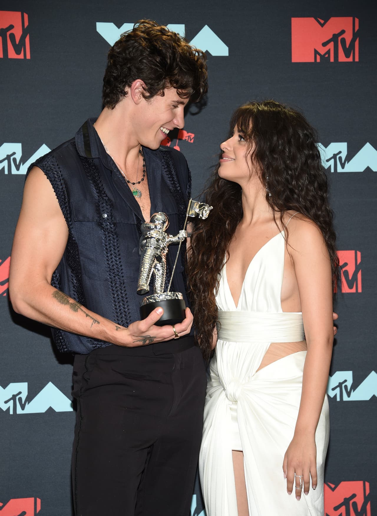 Shawn Mendes, left, and Camila Cabello pose in the press room with the award for best collaboration for "Senorita" at the MTV Video Music Awards at the Prudential Center on Monday, Aug. 26, 2019, in Newark, N.J. (Photo by Evan Agostini/Invision/AP)
