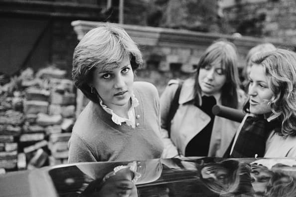 Nineteen year-old Lady Diana Spencer (1961 - 1997, later Diana, Princess of Wales), interviewed by the press while getting into a car, London, UK, 12th November 1980. (Photo by John Minihan/Evening Standard/Hulton Archive/Getty Images)