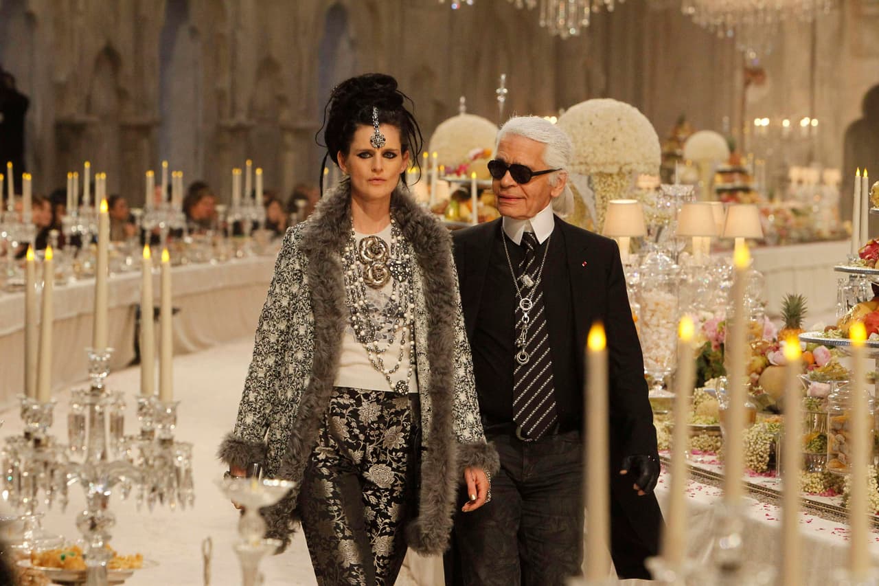 PARIS, FRANCE - DECEMBER 06: Stella Tennant and Karl Lagerfeld walk on the catwalk at theChanel Paris-Bombay Show at Grand Palais on December 6, 2011 in Paris, France. (Photo by Michel Dufour/WireImage)