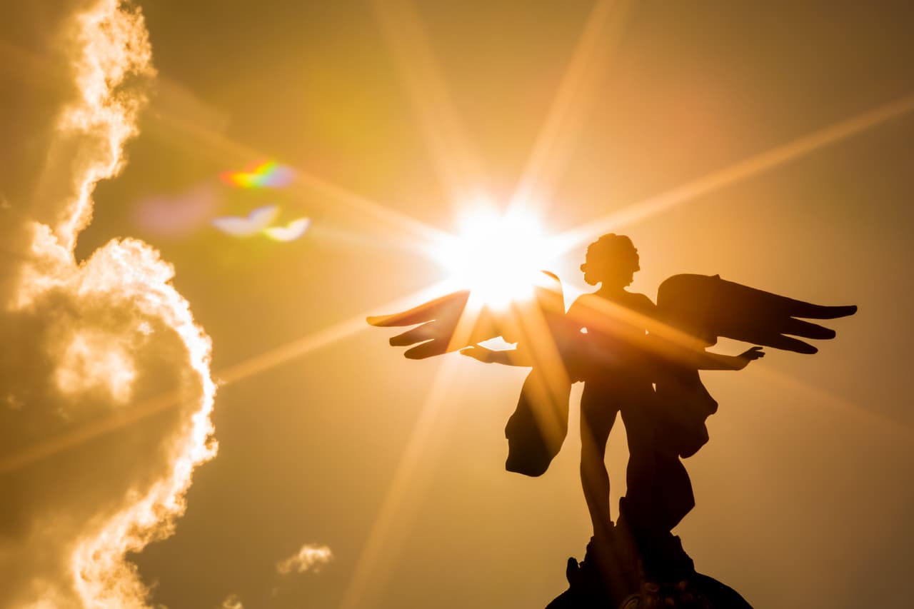 Angel with sunbeams