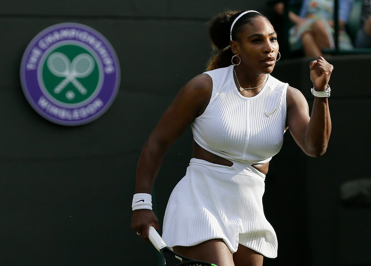 United States' Serena Williams celebrates after beating Slovenia's Kaja Juvan in a Women's singles match during day four of the Wimbledon Tennis Championships in London, Thursday, July 4, 2019. (AP Photo/Tim Ireland)