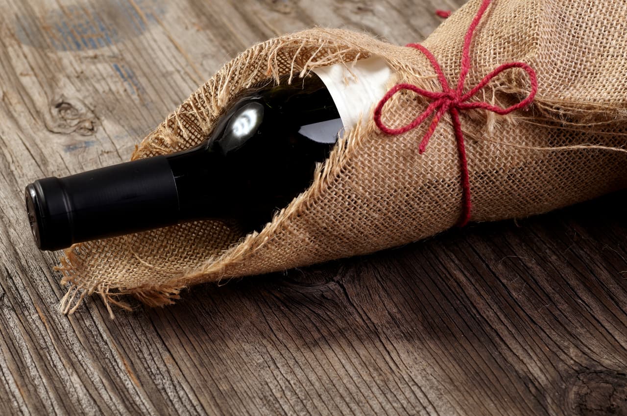Red wine on wooden table