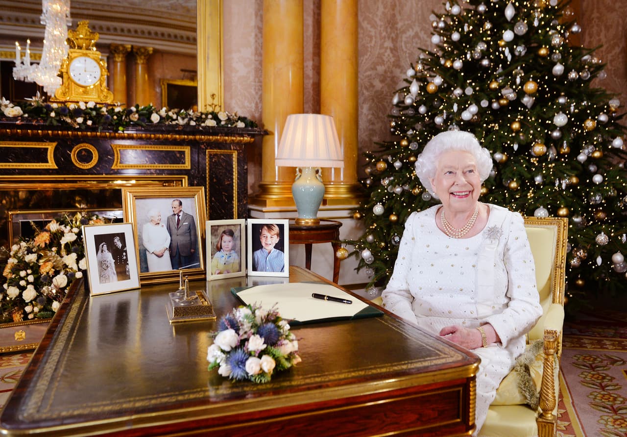 LONDON, UNITED KINGDOM - In this undated image supplied by Sky News, Queen Elizabeth II sits at a desk in the 1844 Room at Buckingham Palace, after recording her Christmas Day broadcast to the Commonwealth at Buckingham Palace, London. (Photo by John Stillwell - WPA Pool/ Getty Images)