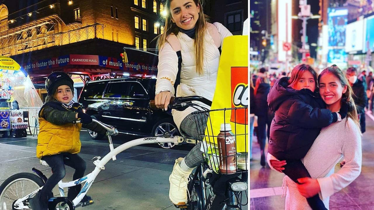 Michelle Renaud y su hijo recorren las calles de Central Park en un paseo en bicicleta