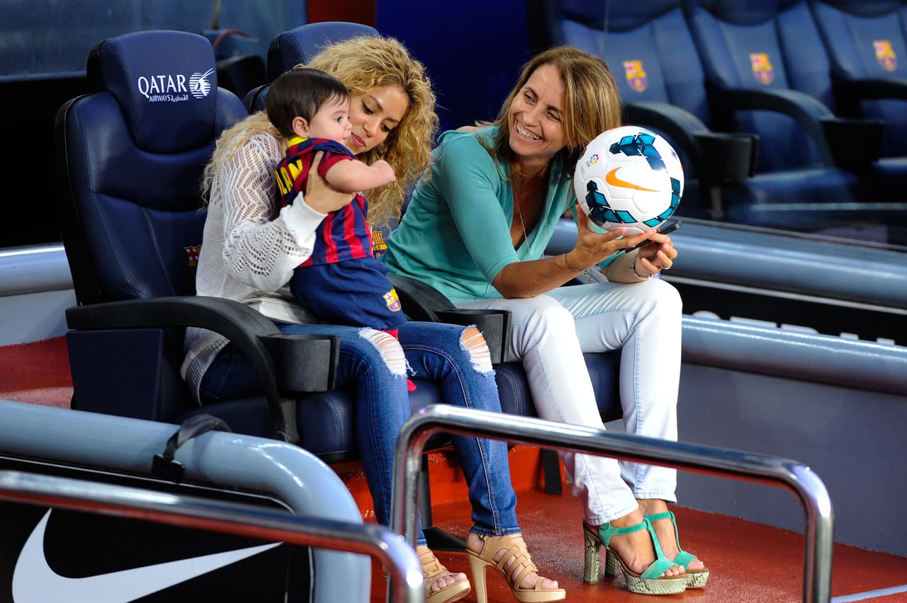 BARCELONA, SPAIN - SEPTEMBER 14: Shakira and Montserrat Bernabeu, Gerard Pique's mother, play with Milan prior to the La Liga match between FC Barcelona and Sevilla FC at Camp Nou on September 14, 2013 in Barcelona, Spain. (Photo by David Ramos/Getty Images)