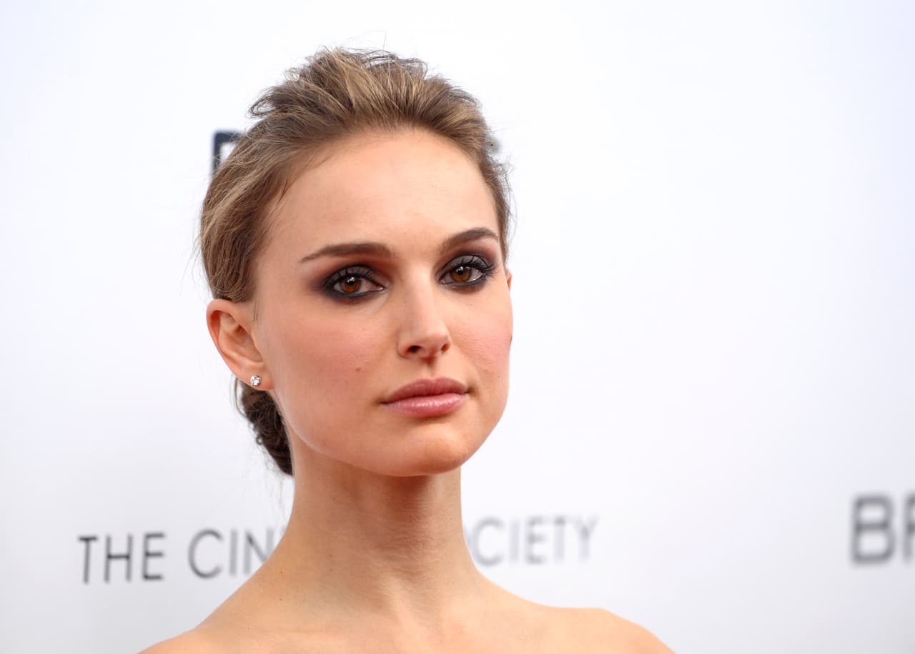 Actress Natalie Portman attends The Cinema Society premiere of "Brothers" in New York on Sunday, Nov. 22, 2009. (AP Photo/Peter Kramer)