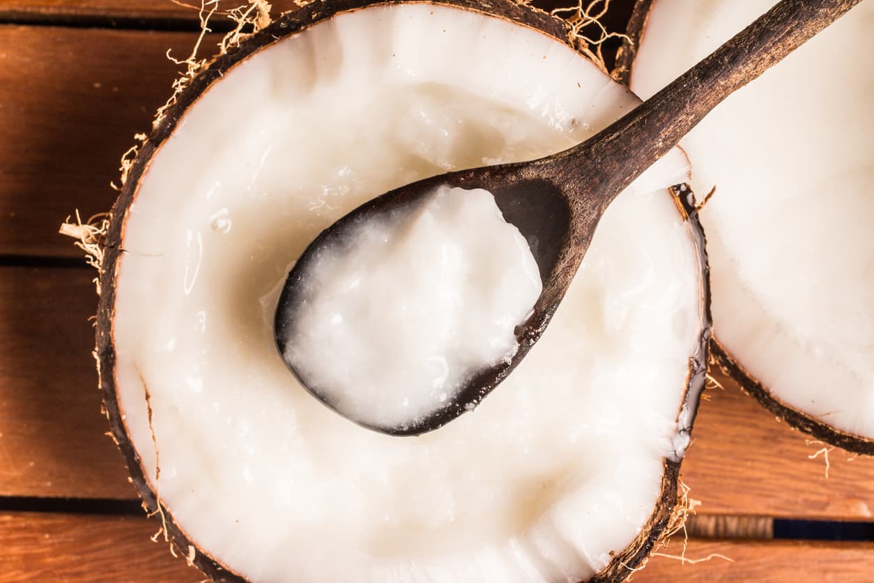 Coconut Oil Jar over a wooden table