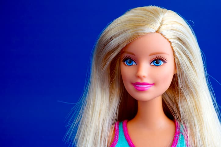 Tambov, Russian Federation - March 31, 2016: Barbie doll portrait on blue background. Studio shot.