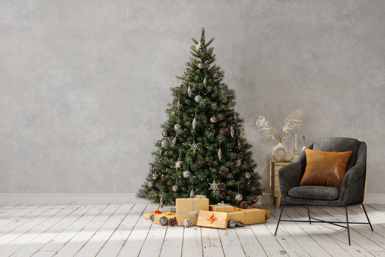 Christmas Tree, Gift Boxes With Ribbons And Armchair In A Room