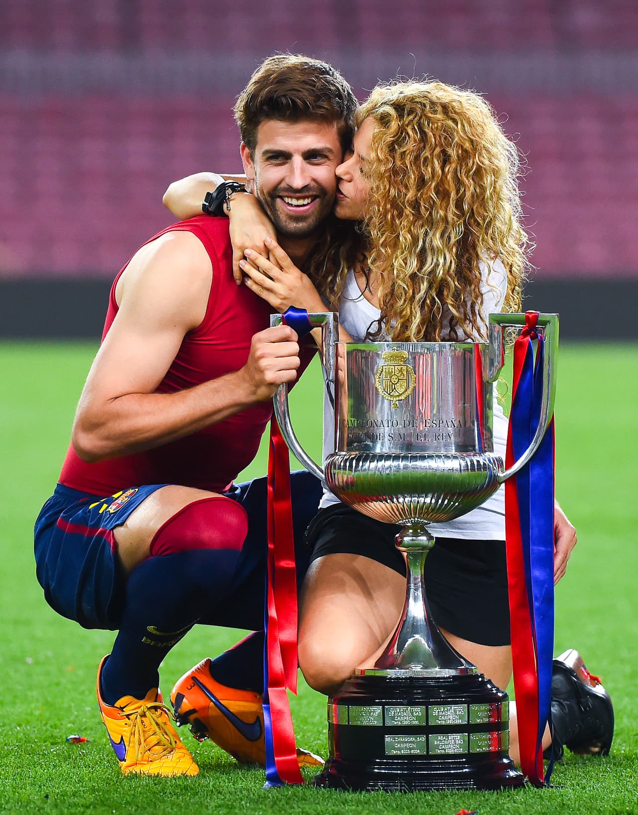BARCELONA, SPAIN - MAY 30: Gerard Pique of FC Barcelona and Shakira pose with the trophy after FC Barcelona won the Copa del Rey Final match against Athletic Club at Camp Nou on May 30, 2015 in Barcelona, Spain. (Photo by David Ramos/Getty Images)