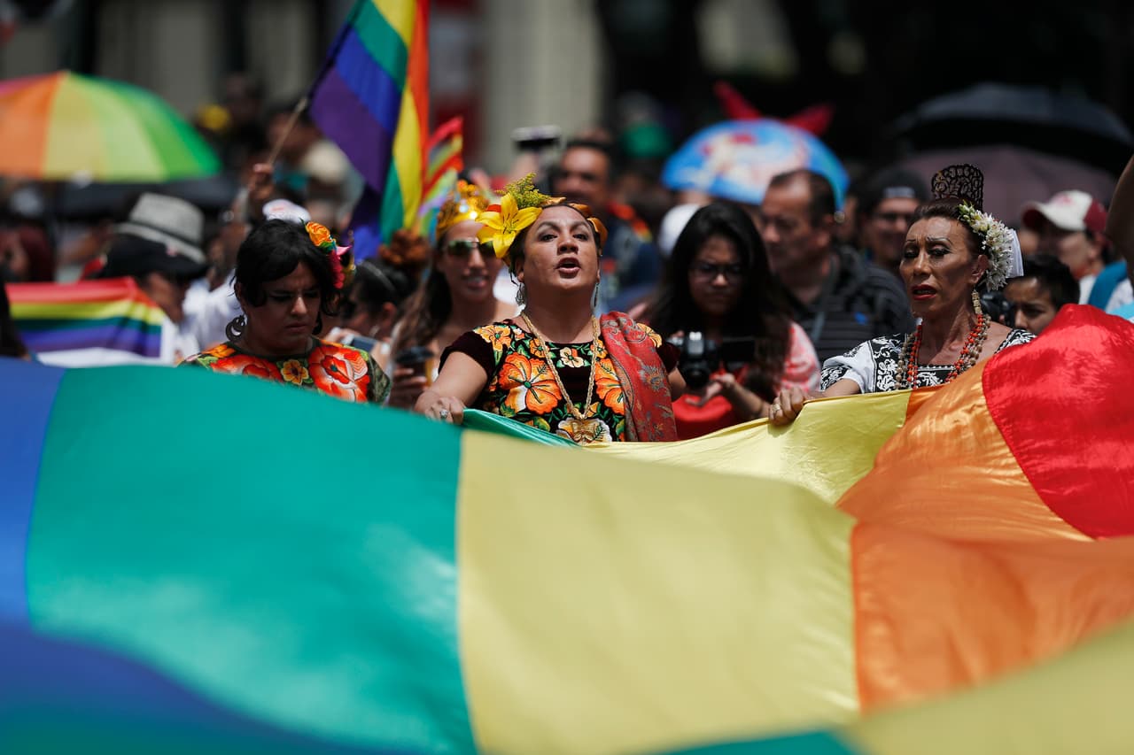 Revelers take part in Mexico City's gay pride parade, Saturday, June 24, 2017. Thousands marched down Paseo de la Reforma for one of the largest gay pride events in Latin America. (AP Photo/Eduardo Verdugo)